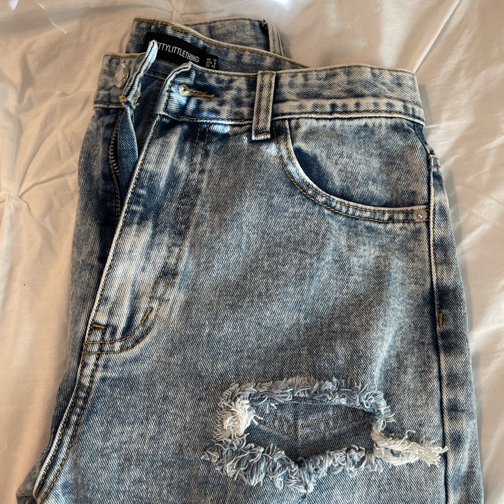 PrettyLittleThing ice blue distressed split hem.